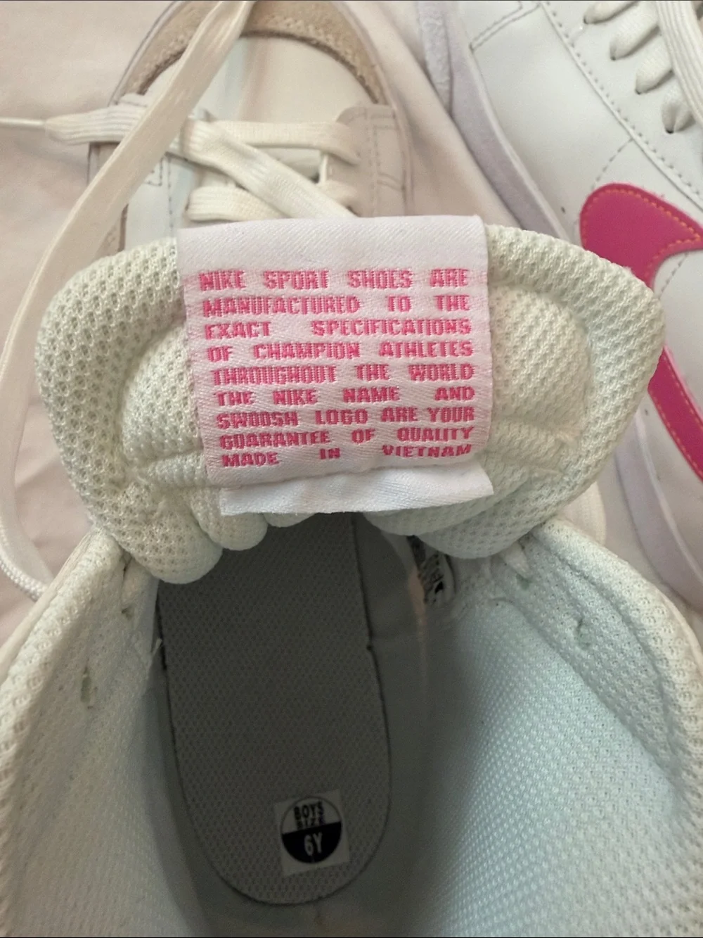 Nike Blazers High-Top Sneakers with Pink Swoosh Accents and Yellow “Nike”